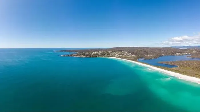 Framed Print : An aerial view of the iconic lichen covered rocks and turqoise ocean water in the Bay of Fires near Binalong Bay