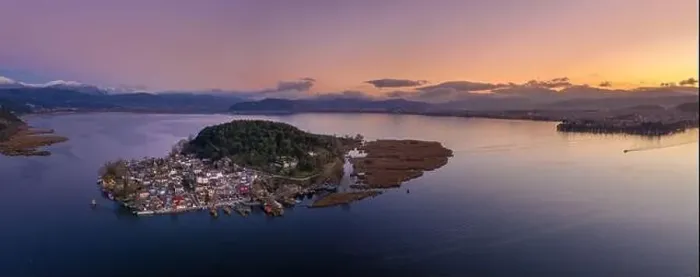 Framed Print : Aerial view of Ioannina city in Greece, Aslan Pasha Tzami, the lake with the island of Kyra Frosini or nissaki Framed Print : Aerial view of Ioannina city in Greece, Aslan Pasha Tzami, the lake with the island of Kyra Frosini or nissaki