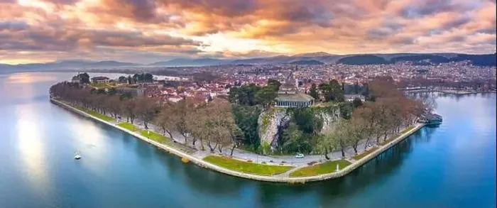 Framed Print : Aerial view of Ioannina city in Greece, Aslan Pasha Tzami, the lake with the island of Kyra Frosini or nissaki Framed Print : Aerial view of Ioannina city in Greece, Aslan Pasha Tzami, the lake with the island of Kyra Frosini or nissaki