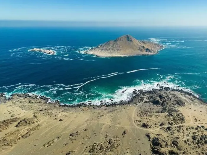 Framed Print : Aerial view of Isla Pan de Azúcar in the National Park Pan de Azúcar at the coast of the Atacama desert in Chile Framed Print : Aerial view of Isla Pan de Azúcar in the National Park Pan de Azúcar at the coast of the Atacama desert in Chile