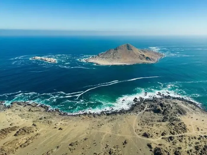 Framed Print : Aerial view of Isla Pan de Azúcar in the National Park Pan de Azúcar at the coast of the Atacama desert in Chile