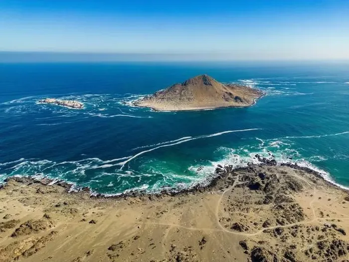 Framed Print : Aerial view of Isla Pan de Azúcar in the National Park Pan de Azúcar at the coast of the Atacama desert in Chile Framed Print : Aerial view of Isla Pan de Azúcar in the National Park Pan de Azúcar at the coast of the Atacama desert in Chile