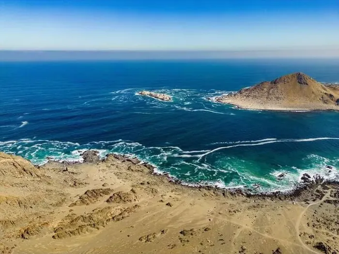 Framed Print : Aerial view of Isla Pan de Azúcar in the National Park Pan de Azúcar at the coast of the Atacama desert in Chile Framed Print : Aerial view of Isla Pan de Azúcar in the National Park Pan de Azúcar at the coast of the Atacama desert in Chile