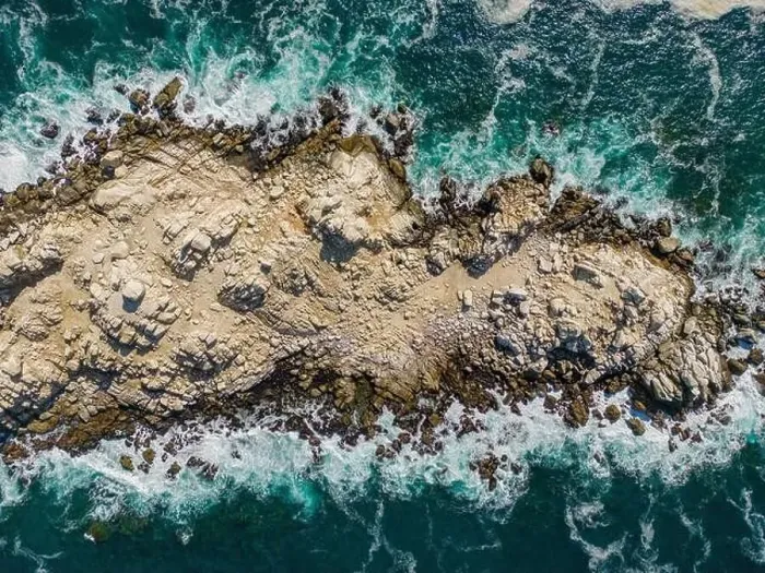 Framed Print : Aerial view of Isla Pan de Azúcar in the National Park Pan de Azúcar at the coast of the Atacama desert in Chile Framed Print : Aerial view of Isla Pan de Azúcar in the National Park Pan de Azúcar at the coast of the Atacama desert in Chile