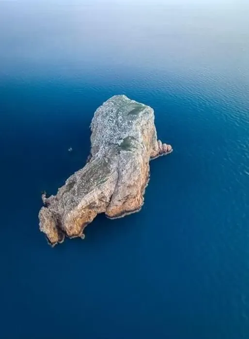 Framed Print : Aerial view of Isola Foradada island in front of the rocky promontory of Capo Caccia at sunset Framed Print : Aerial view of Isola Foradada island in front of the rocky promontory of Capo Caccia at sunset