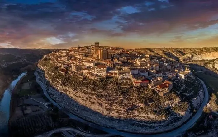 Framed Print : Aerial view of Jorquera medieval town with city walls and castle circled by the bend of the Jucar river in Spain Framed Print : Aerial view of Jorquera medieval town with city walls and castle circled by the bend of the Jucar river in Spain