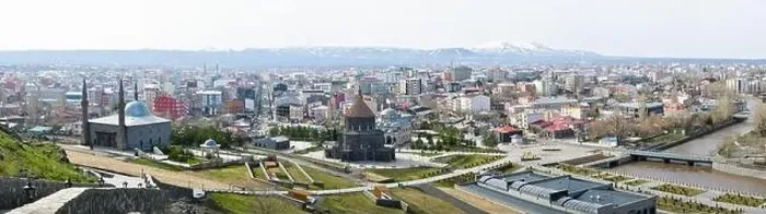 Framed Print : Aerial view Kars city panorama buildings with buildings and mountains background. Travel holidays in Kars Framed Print : Aerial view Kars city panorama buildings with buildings and mountains background. Travel holidays in Kars