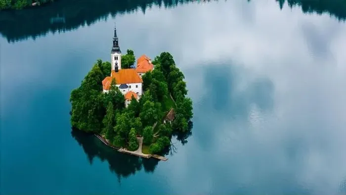 Framed Print : Aerial View of Lake Bled Church in Summer Fog Framed Print : Aerial View of Lake Bled Church in Summer Fog