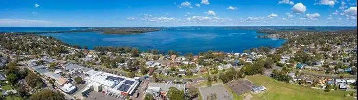 Framed Print : Aerial view of Lake Munmorah and the township of Budgewoi on the central coast of regional New South Wales in Australia Framed Print : Aerial view of Lake Munmorah and the township of Budgewoi on the central coast of regional New South Wales in Australia