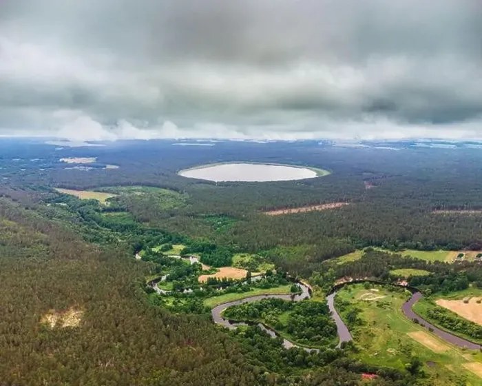 Framed Print : Aerial view of the lake and river in the forest. River Merkys and lake Glebo, Lithuania, Varena district Framed Print : Aerial view of the lake and river in the forest. River Merkys and lake Glebo, Lithuania, Varena district
