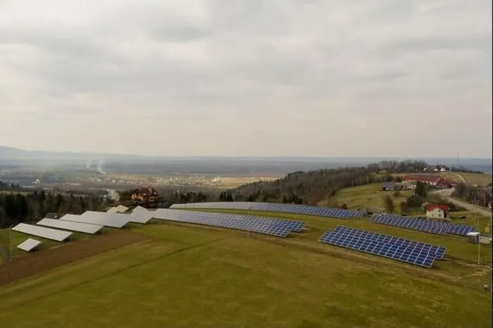 Framed Print : Aerial view of large field of solar photo voltaic panels system producing renewable clean energy on green grass Framed Print : Aerial view of large field of solar photo voltaic panels system producing renewable clean energy on green grass