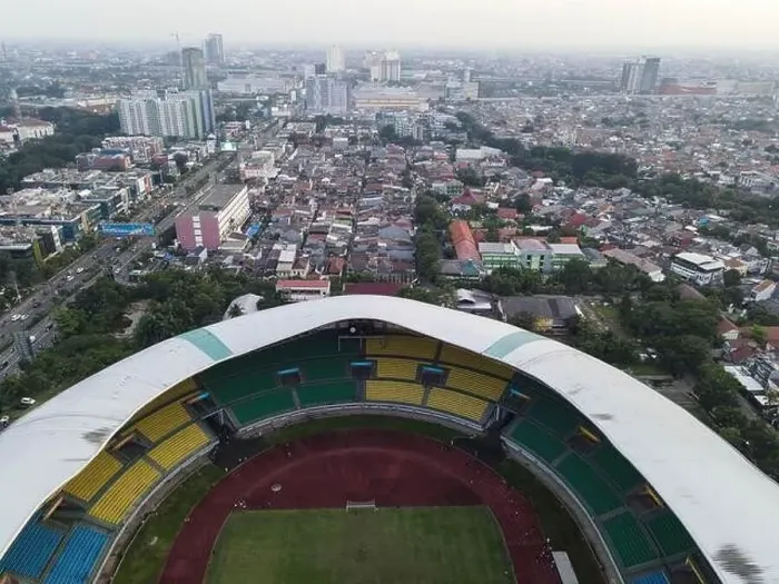 Framed Print : Aerial View of The largest stadium of Bekasi from drone when sunset and noise cloud. Bekasi, Indonesia, March 21, 2021 Framed Print : Aerial View of The largest stadium of Bekasi from drone when sunset and noise cloud. Bekasi, Indonesia, March 21, 2021