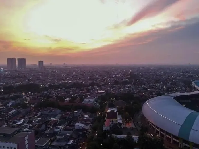 Framed Print : Aerial View of The largest stadium of Bekasi from drone when sunset and noise cloud. Bekasi, Indonesia, March 21, 2021 Framed Print : Aerial View of The largest stadium of Bekasi from drone when sunset and noise cloud. Bekasi, Indonesia, March 21, 2021