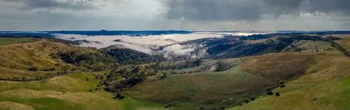 Framed Print : Aerial view of low-level clouds in a large green valley in the Central Tablelands in regional New South Wales Australia Framed Print : Aerial view of low-level clouds in a large green valley in the Central Tablelands in regional New South Wales Australia