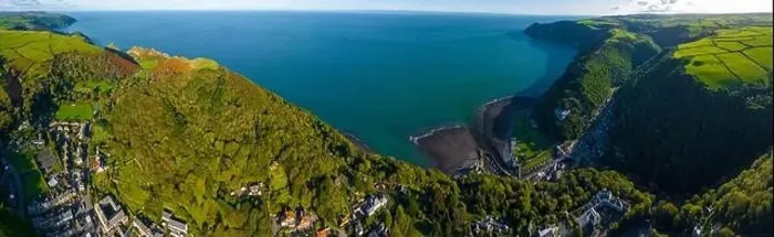 Framed Print : Aerial view of Lynton, a town on the Exmoor coast in the North Devon district in the county of Devon, England Framed Print : Aerial view of Lynton, a town on the Exmoor coast in the North Devon district in the county of Devon, England