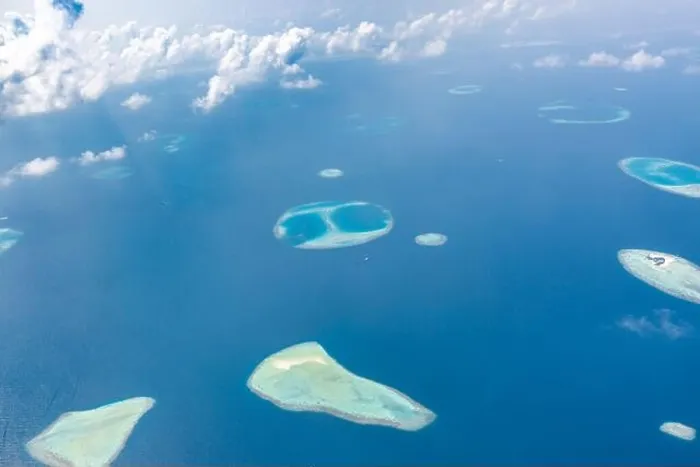 Framed Print : Aerial view of Maldives atolls is the world top beauty. Maldives tourism. Indian ocean with Maldivian island, aerial photography Framed Print : Aerial view of Maldives atolls is the world top beauty. Maldives tourism. Indian ocean with Maldivian island, aerial photography