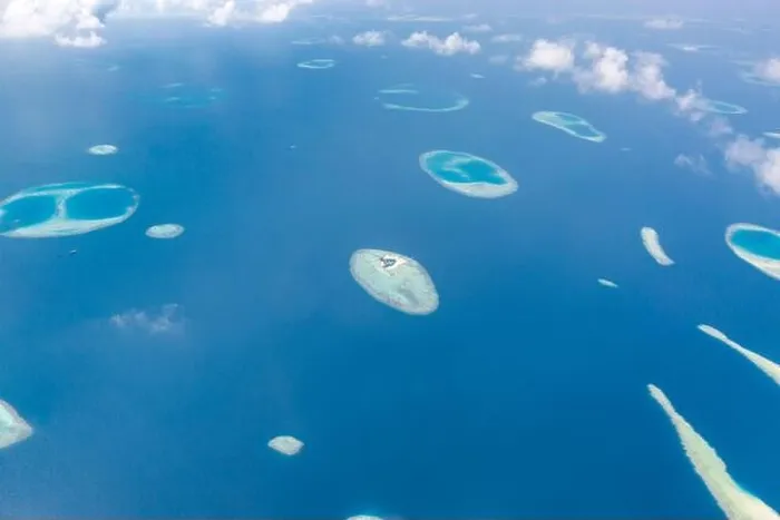 Framed Print : Aerial view of Maldives atolls is the world top beauty. Maldives tourism. Indian ocean with Maldivian island, aerial photography Framed Print : Aerial view of Maldives atolls is the world top beauty. Maldives tourism. Indian ocean with Maldivian island, aerial photography