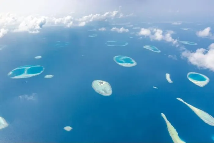 Framed Print : Aerial view of Maldives atolls is the world top beauty. Maldives tourism. Indian ocean with Maldivian island, aerial photography Framed Print : Aerial view of Maldives atolls is the world top beauty. Maldives tourism. Indian ocean with Maldivian island, aerial photography