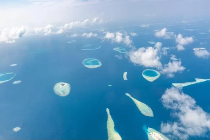 Framed Print : Aerial view of Maldives atolls is the world top beauty. Maldives tourism. Indian ocean with Maldivian island, aerial photography Framed Print : Aerial view of Maldives atolls is the world top beauty. Maldives tourism. Indian ocean with Maldivian island, aerial photography
