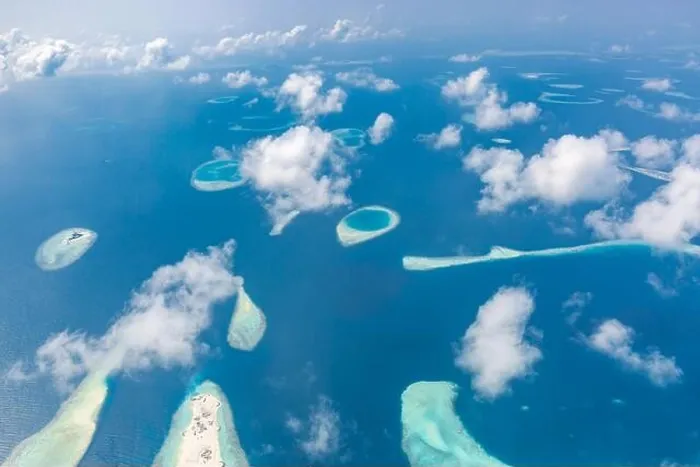 Framed Print : Aerial view of Maldives atolls is the world top beauty. Maldives tourism. Indian ocean with Maldivian island, aerial photography Framed Print : Aerial view of Maldives atolls is the world top beauty. Maldives tourism. Indian ocean with Maldivian island, aerial photography