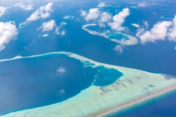Framed Print : Aerial view of Maldives atolls is the world top beauty. Maldives tourism. Indian ocean with Maldivian island, aerial photography Framed Print : Aerial view of Maldives atolls is the world top beauty. Maldives tourism. Indian ocean with Maldivian island, aerial photography