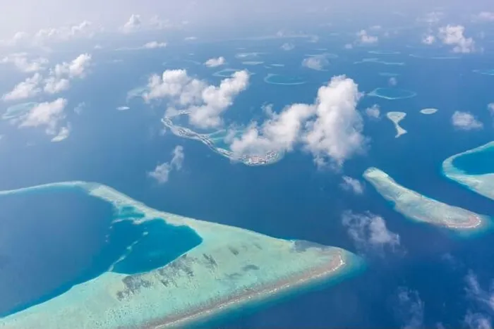 Framed Print : Aerial view of Maldives atolls is the world top beauty. Maldives tourism. Indian ocean with Maldivian island, aerial photography Framed Print : Aerial view of Maldives atolls is the world top beauty. Maldives tourism. Indian ocean with Maldivian island, aerial photography