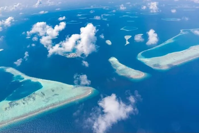 Framed Print : Aerial view of Maldives atolls is the world top beauty. Maldives tourism. Indian ocean with Maldivian island, aerial photography Framed Print : Aerial view of Maldives atolls is the world top beauty. Maldives tourism. Indian ocean with Maldivian island, aerial photography