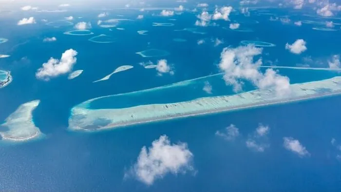 Framed Print : Aerial view of Maldives atolls is the world top beauty. Maldives tourism. Indian ocean with Maldivian island, aerial photography Framed Print : Aerial view of Maldives atolls is the world top beauty. Maldives tourism. Indian ocean with Maldivian island, aerial photography