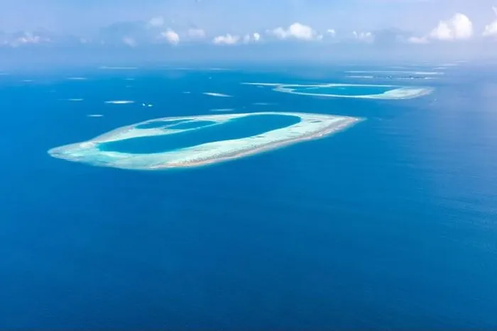 Framed Print : Aerial view of Maldives atolls is the world top beauty. Maldives tourism. Indian ocean with Maldivian island, aerial photography Framed Print : Aerial view of Maldives atolls is the world top beauty. Maldives tourism. Indian ocean with Maldivian island, aerial photography