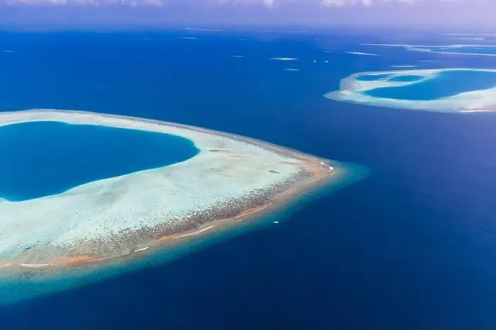 Framed Print : Aerial view of Maldives atolls is the world top beauty. Maldives tourism. Indian ocean with Maldivian island, aerial photography Framed Print : Aerial view of Maldives atolls is the world top beauty. Maldives tourism. Indian ocean with Maldivian island, aerial photography