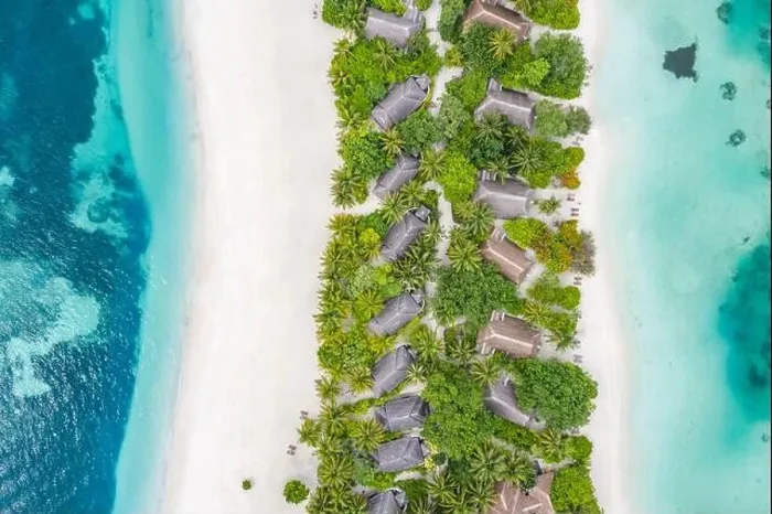 Framed Print : Aerial view on Maldives island. Luxury tropical resort or hotel with beach villas and beautiful beach scenery, coral reef and white sandy landscape
