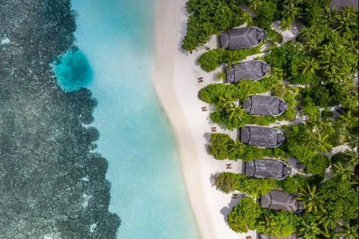 Framed Print : Aerial view on Maldives island. Luxury tropical resort or hotel with beach villas and beautiful beach scenery, coral reef and white sandy landscape Framed Print : Aerial view on Maldives island. Luxury tropical resort or hotel with beach villas and beautiful beach scenery, coral reef and white sandy landscape