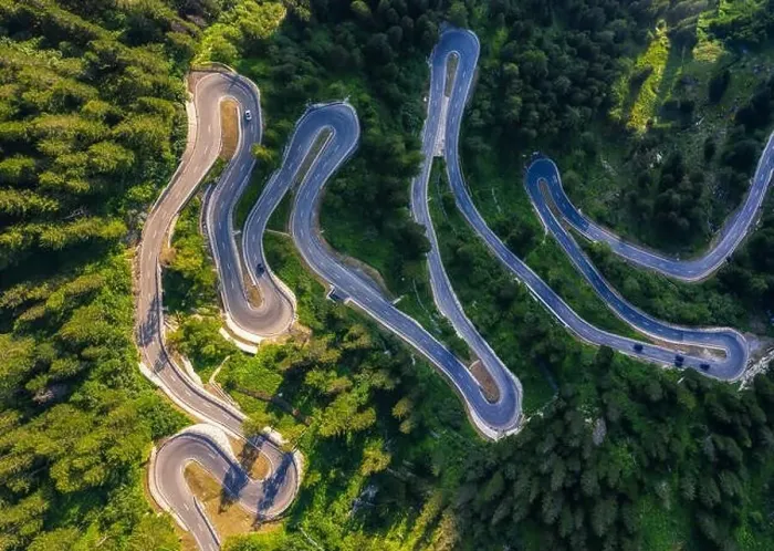 Framed Print : Aerial view of Maloja Pass road in Switzerland