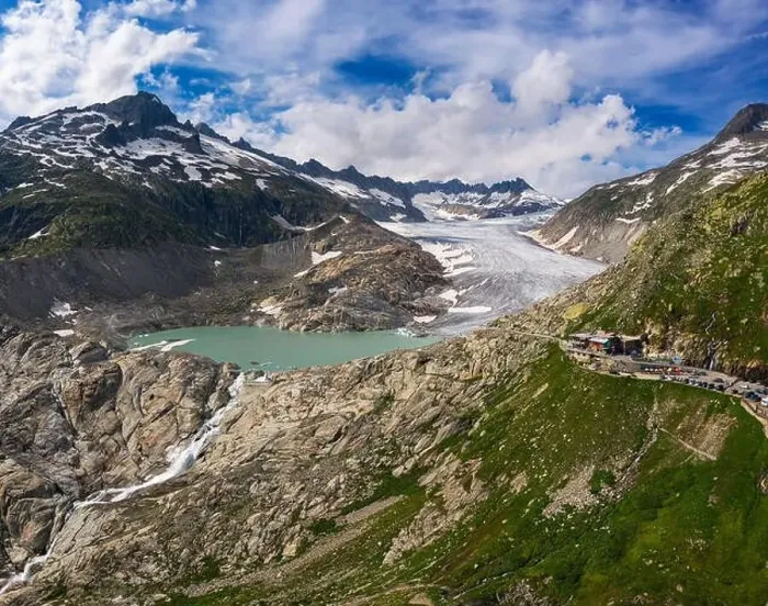Framed Print : Aerial view of the melting Rhone glacier and the glacial lake in the Swiss Alps Framed Print : Aerial view of the melting Rhone glacier and the glacial lake in the Swiss Alps