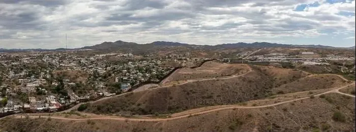 Framed Print : Aerial view of US Mexico Border fence in Nogales, Arizona Framed Print : Aerial view of US Mexico Border fence in Nogales, Arizona