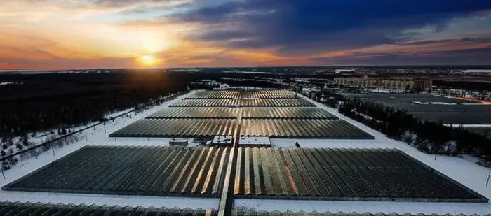 Framed Print : Aerial view of modern glass greenhouses in winter Framed Print : Aerial view of modern glass greenhouses in winter