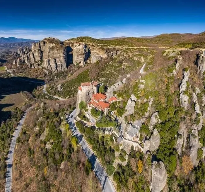 Framed Print : Aerial view of monastery Rousanou and breathtaking picturesque valley and landmark canyon of Meteora at sunset Framed Print : Aerial view of monastery Rousanou and breathtaking picturesque valley and landmark canyon of Meteora at sunset