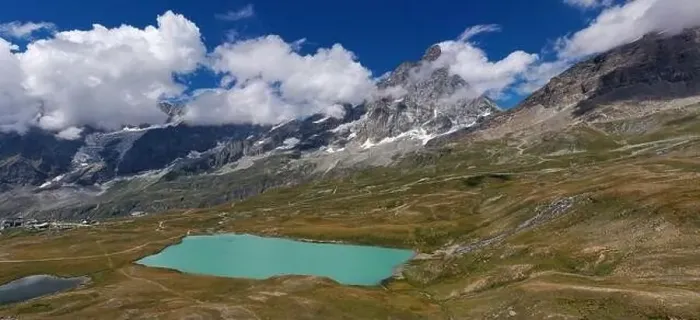 Framed Print : Aerial view of mount Cervino (Matterhorn) and Tramail de Vieille lake from the fields of Plan Maison Framed Print : Aerial view of mount Cervino (Matterhorn) and Tramail de Vieille lake from the fields of Plan Maison