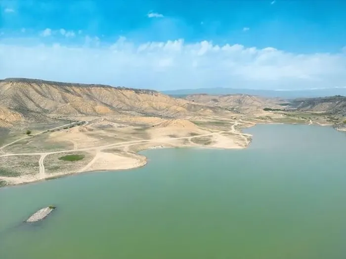 Framed Print : Aerial view on mountain lake. Drone view water reservoir at mountain valley Framed Print : Aerial view on mountain lake. Drone view water reservoir at mountain valley