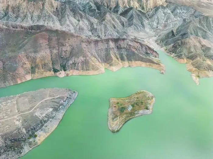 Framed Print : Aerial view on mountain lake. Drone view water reservoir at mountain valley Framed Print : Aerial view on mountain lake. Drone view water reservoir at mountain valley