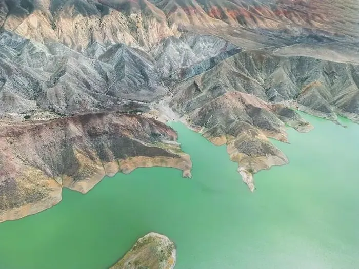 Framed Print : Aerial view on mountain lake. Drone view water reservoir at mountain valley Framed Print : Aerial view on mountain lake. Drone view water reservoir at mountain valley