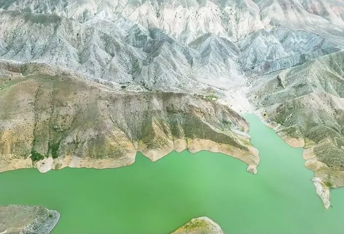 Framed Print : Aerial view on mountain lake. Drone view water reservoir at mountain valley Framed Print : Aerial view on mountain lake. Drone view water reservoir at mountain valley