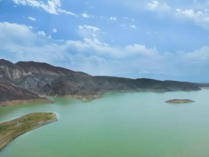Framed Print : Aerial view on mountain lake. Drone over water reservoir at mountain valley Framed Print : Aerial view on mountain lake. Drone over water reservoir at mountain valley