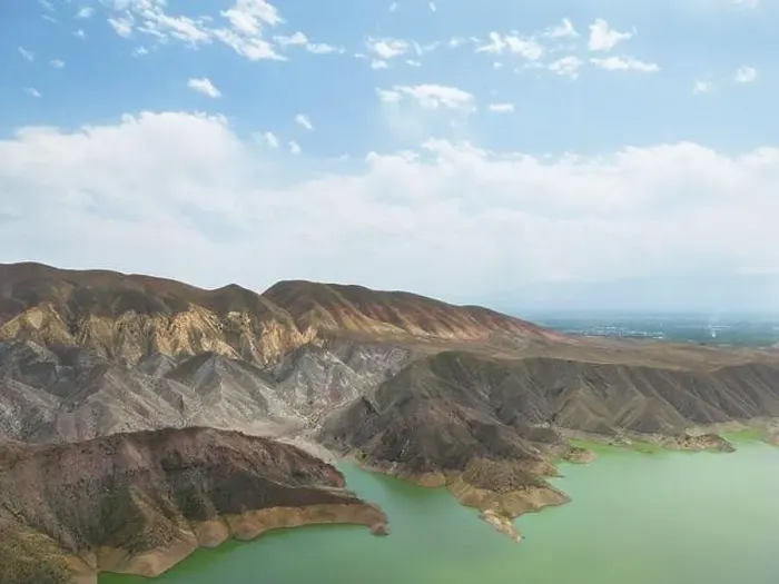 Framed Print : Aerial view on mountain lake. Drone over water reservoir at mountain valley Framed Print : Aerial view on mountain lake. Drone over water reservoir at mountain valley