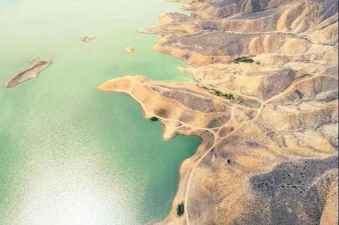 Framed Print : Aerial view on mountain lake. Drone over water reservoir at mountain valley Framed Print : Aerial view on mountain lake. Drone over water reservoir at mountain valley