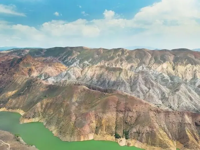 Framed Print : Aerial view on mountain lake. Drone over water reservoir at mountain valley Framed Print : Aerial view on mountain lake. Drone over water reservoir at mountain valley