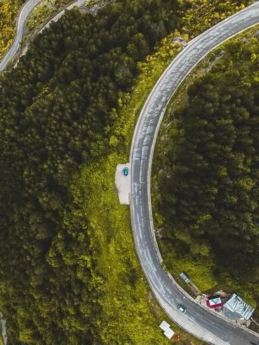 Framed Print : Aerial View of Mountain Road Surrounded by Forest Framed Print : Aerial View of Mountain Road Surrounded by Forest