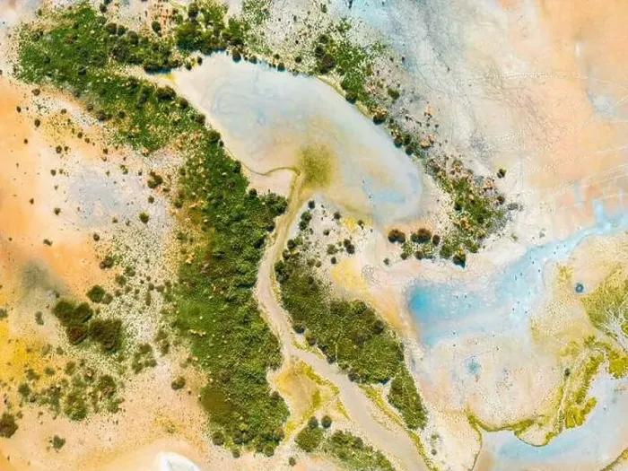 Framed Print : Aerial view of the multicolored texture and patterns of Yarisli Lake in Burdur, Turkey Framed Print : Aerial view of the multicolored texture and patterns of Yarisli Lake in Burdur, Turkey