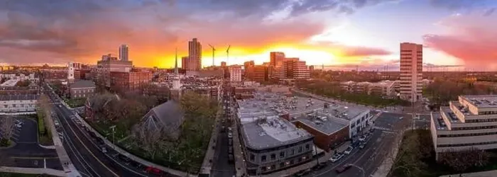 Framed Print : Aerial view of New Brunswick business downtown in New Jersey with stunning colorful sunset sky Framed Print : Aerial view of New Brunswick business downtown in New Jersey with stunning colorful sunset sky