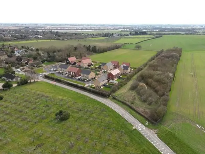Framed Print : Aerial view of a new social and private housing development at the edge of an East Anglian village Framed Print : Aerial view of a new social and private housing development at the edge of an East Anglian village